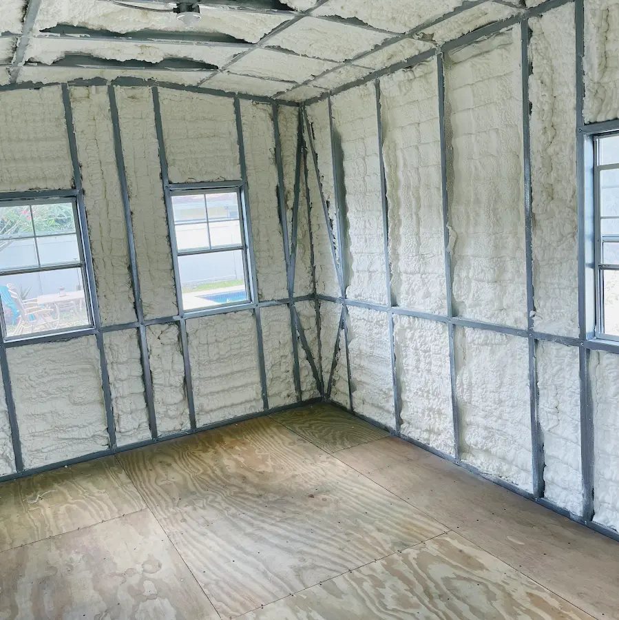 Closed-cell spray foam insulation applied to wall cavities in a residential project in Winfield